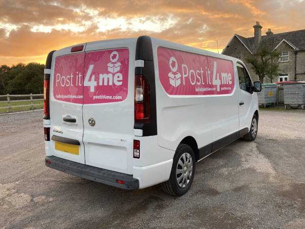 Digital print signs on a white van