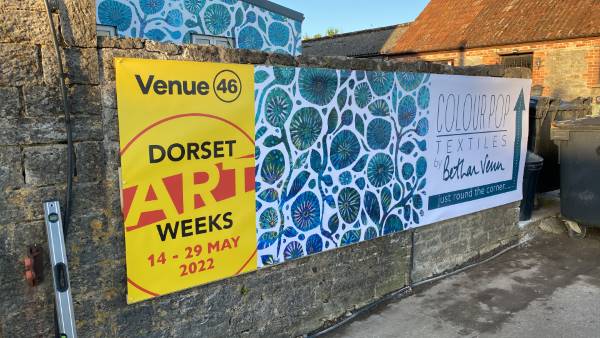 A banner sign for a Dorset art exhibition